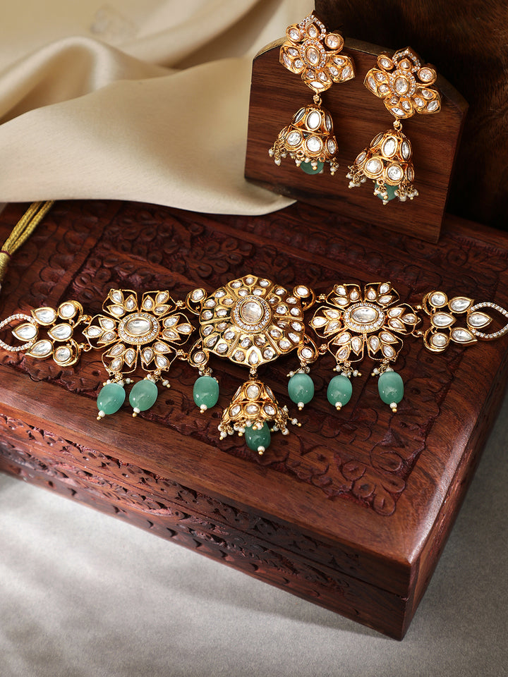 Gold Plated Kundan Choker Set With Mint Green Stone.