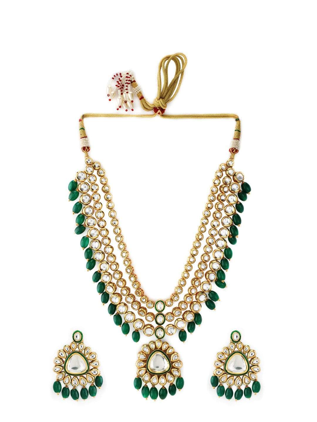 Pooja Raina in Kundan layered Necklace with Green Hangings. Necklace Set