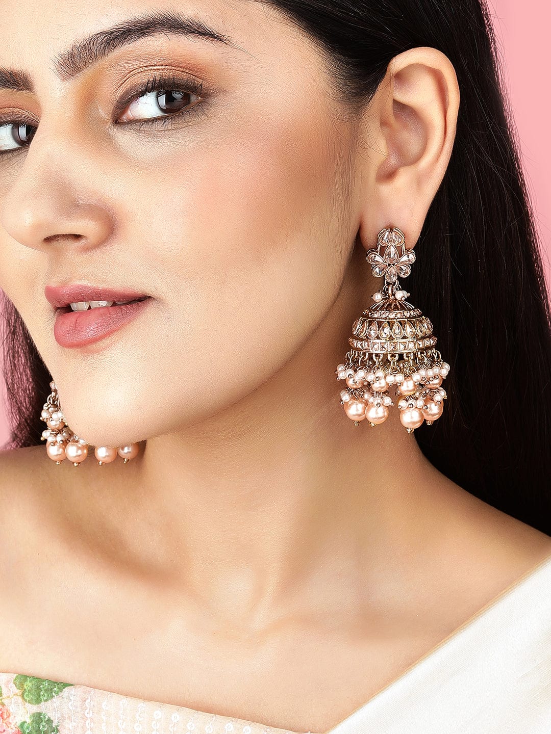 Rubans Gold Plated Handcrafted AD Studded & White Beads Jhumka Earrings Earrings