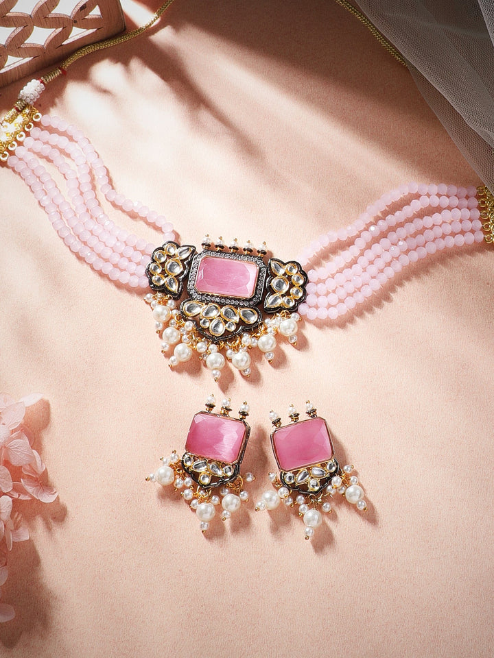 Rubans gold plated kundan choker set with white coloured beads and pastel pink stones. Necklace Set