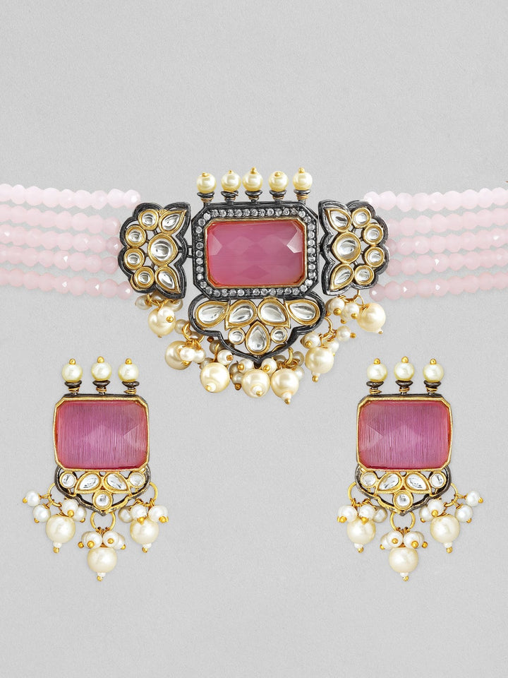 Rubans gold plated kundan choker set with white coloured beads and pastel pink stones. Necklace Set