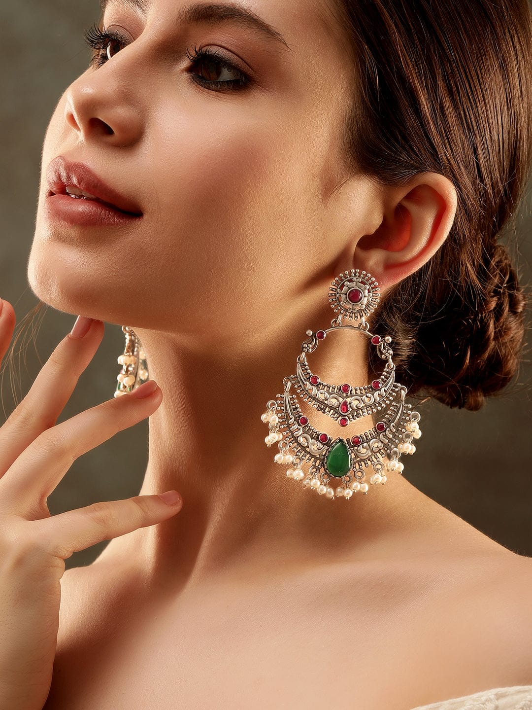 Rubans Illuminating Silver Base Chandbali Earrings with Green and Pink Stones Earrings